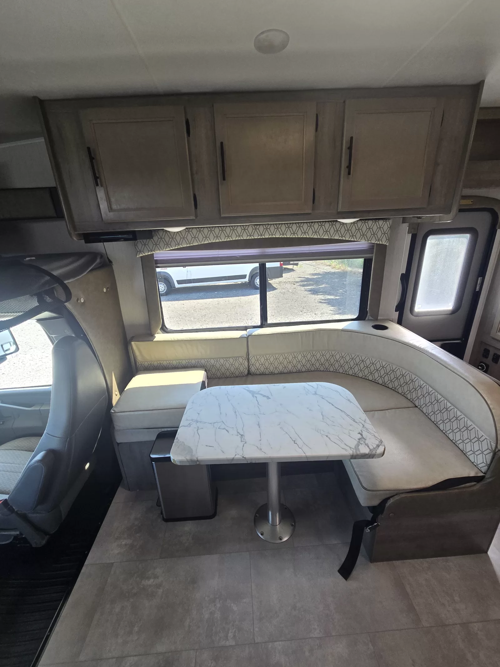 2021 Coachmen Freelander 26DS Class C kitchen and dining area at Bell Camper Sales in Bartlesville, Oklahoma
