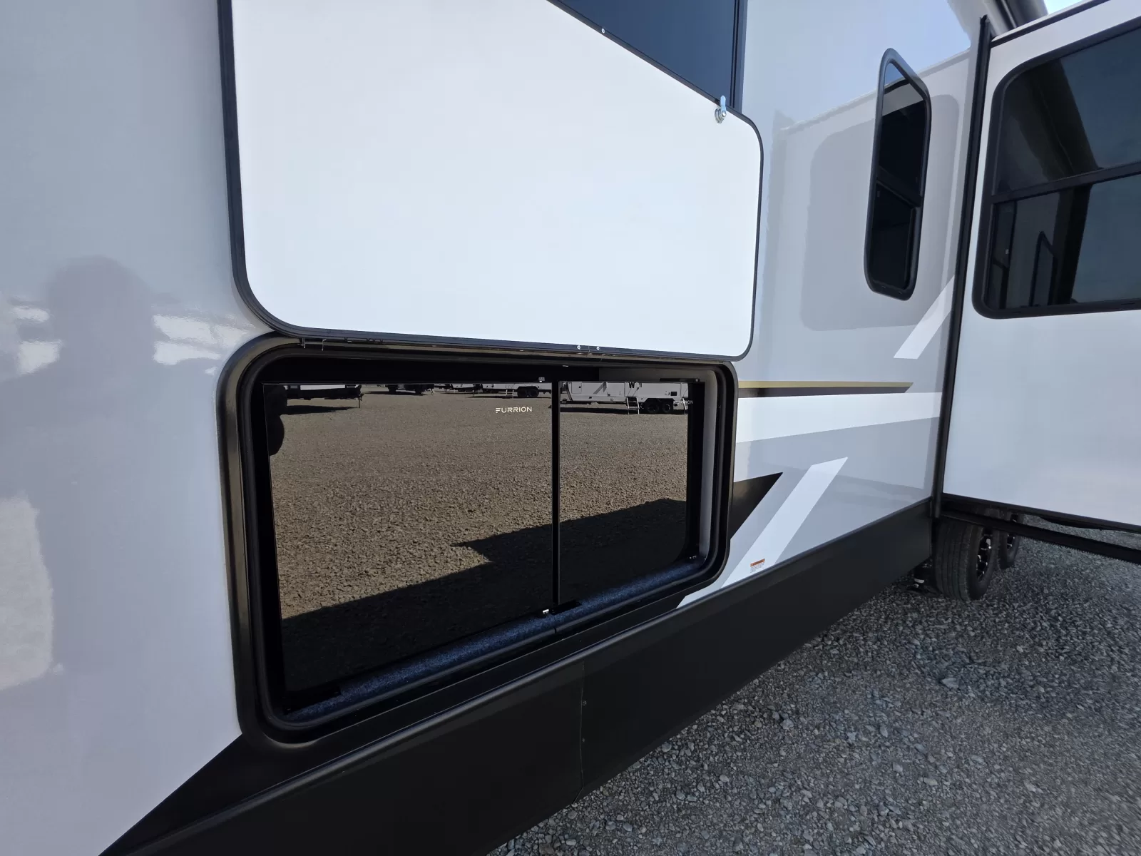 2027 Forest River Impression 36BR3 fifth wheel storage compartment available at Bell Camper Sales in Bartlesville, Oklahoma
