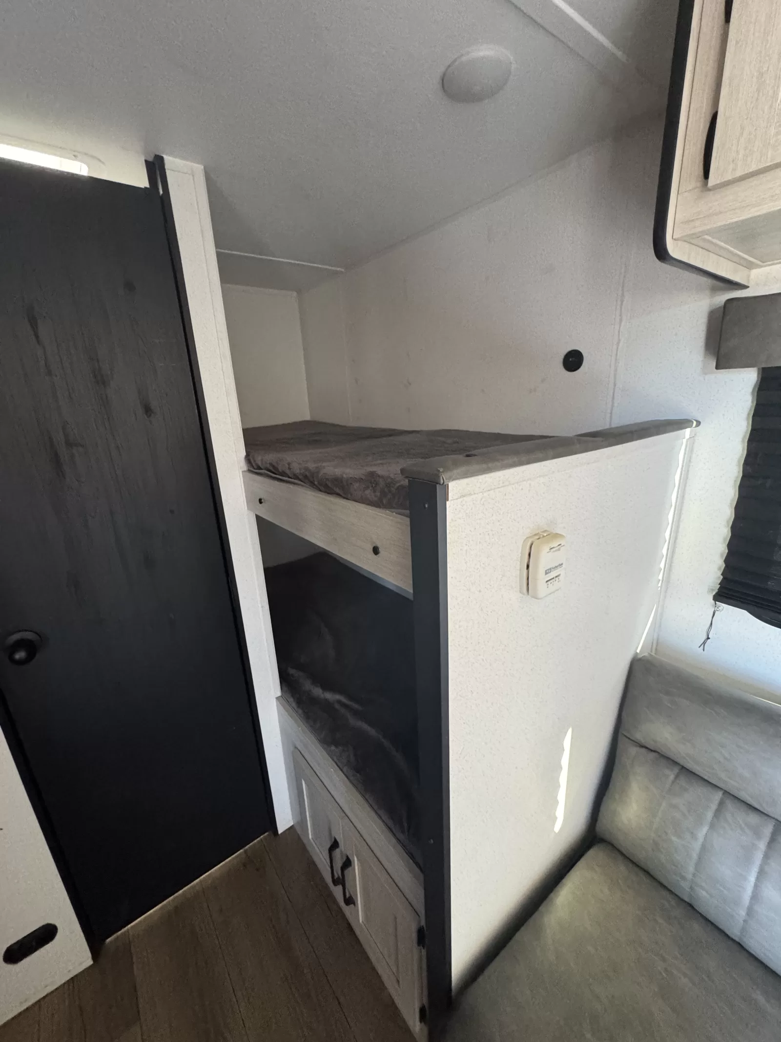 2025 Palomino Puma 16BHC travel trailer kitchen and dining available at Bell Camper Sales in Bartlesville, Oklahoma