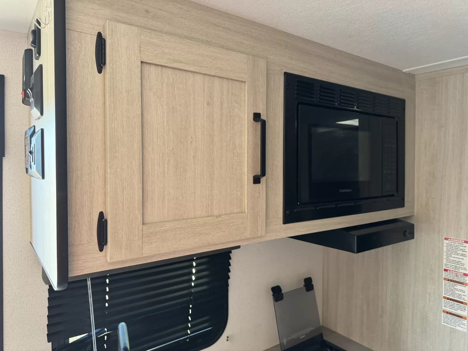 2025 Palomino Puma 16BHC travel trailer storage compartment available at Bell Camper Sales in Bartlesville, Oklahoma