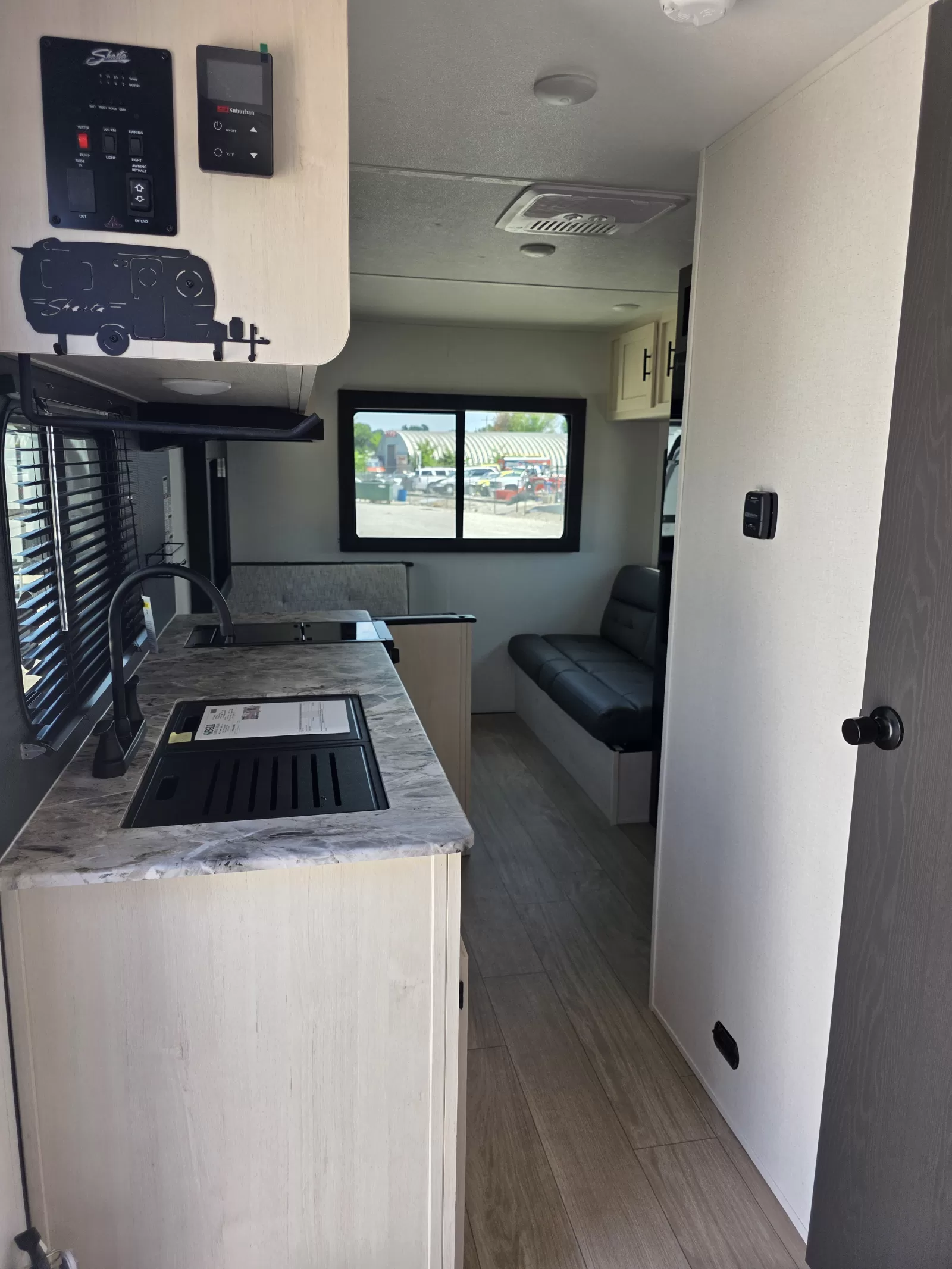 2027 Shasta Oasis 521CK travel trailer exterior detail available at Bell Camper Sales in Bartlesville, Oklahoma