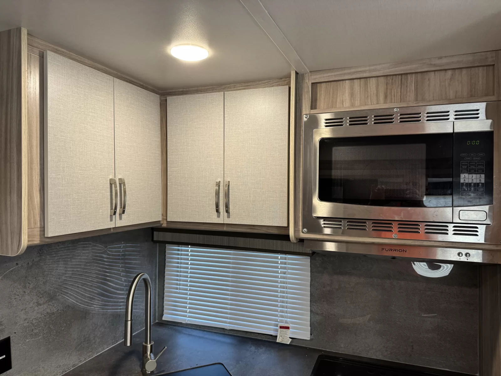 2022 Winnebago Minnie 2327TB travel trailer hitch detail at Bell Camper Sales in Bartlesville, Oklahoma