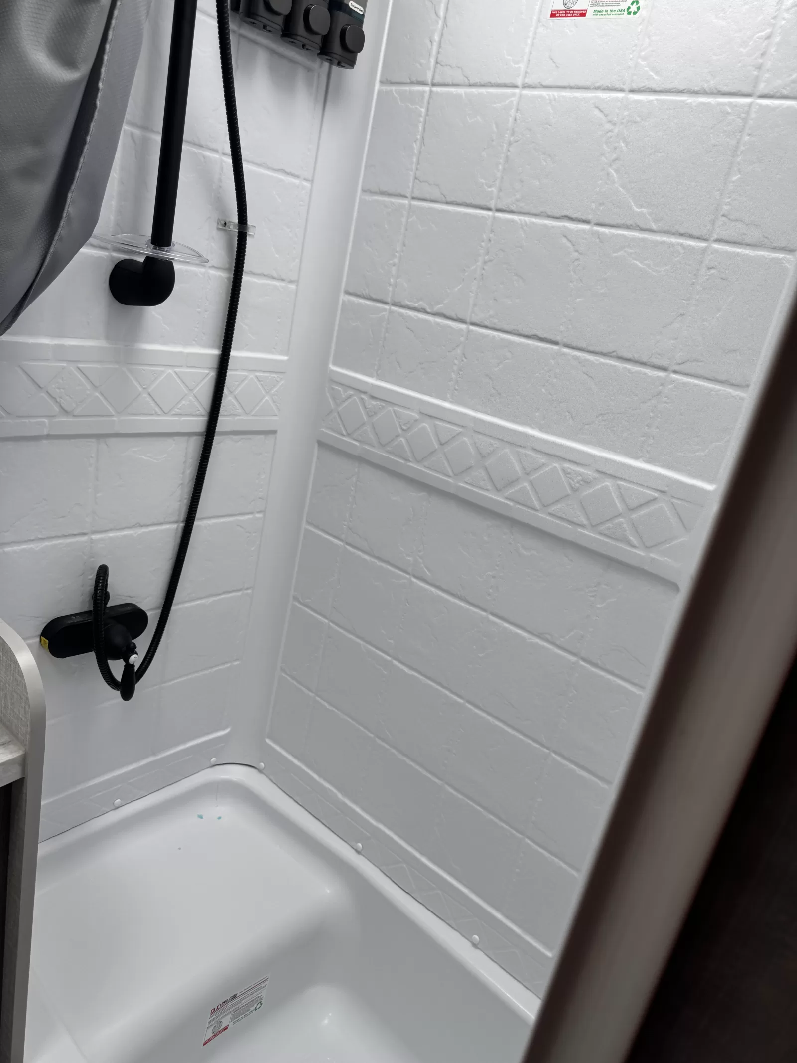 2025 Lance 975 truck camper bathroom available at Bell Camper Sales in Bartlesville, Oklahoma