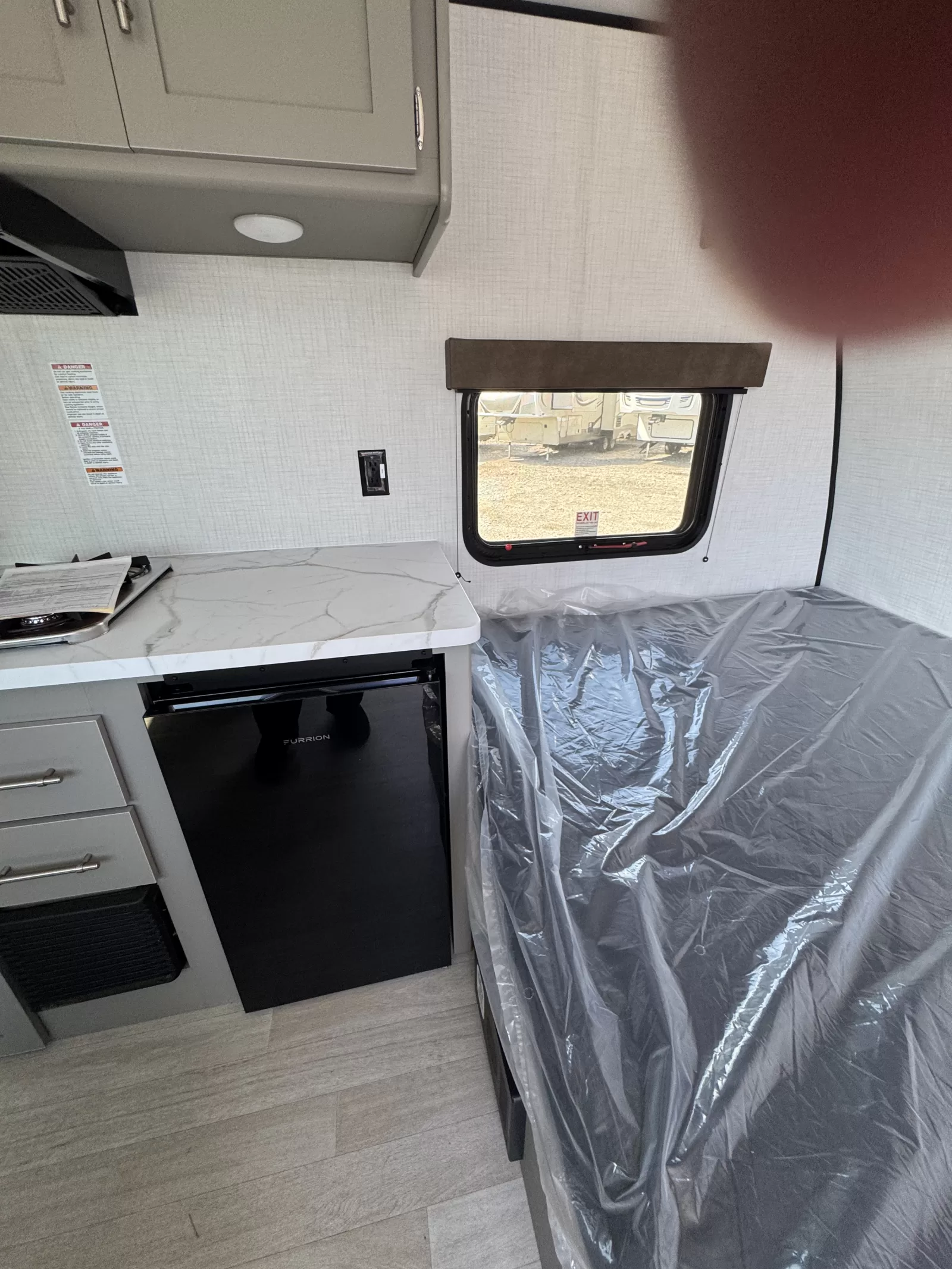 2027 Keystone Hideout 120BT travel trailer window detail available at Bell Camper Sales in Bartlesville, Oklahoma