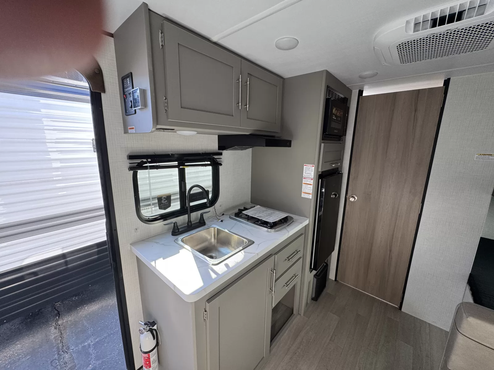 2027 Keystone Hideout 161BH travel trailer bathroom available at Bell Camper Sales in Bartlesville, Oklahoma