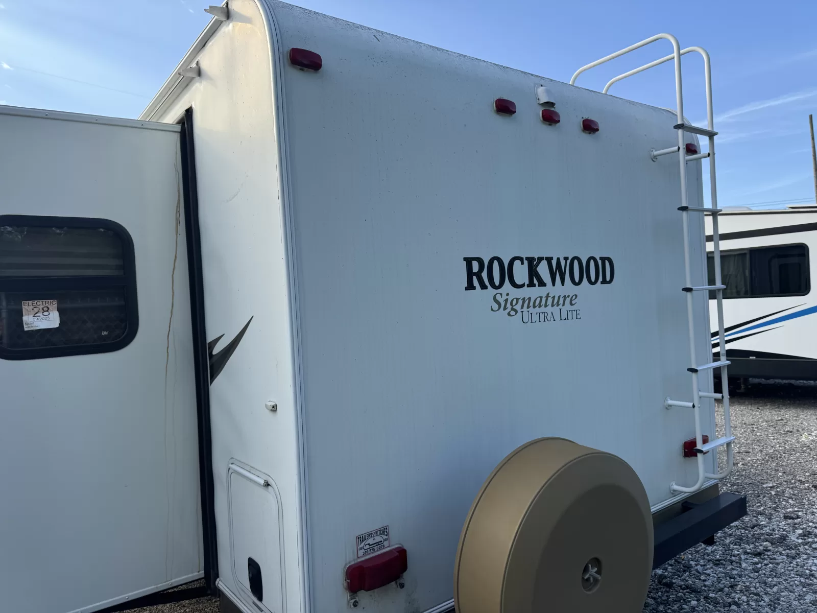 2012 Rockwood Signature Light 8319SS travel trailer rear exterior available at Bell Camper Sales in Bartlesville, Oklahoma