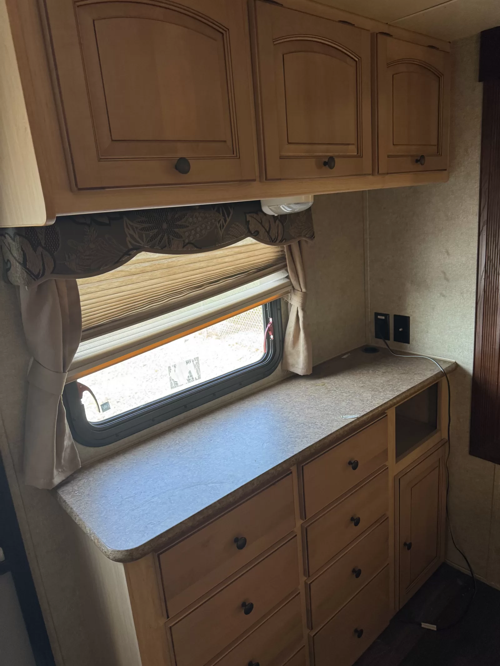 2012 Rockwood Signature Light 8319SS travel trailer kitchen and dining area available at Bell Camper Sales in Bartlesville, Oklahoma