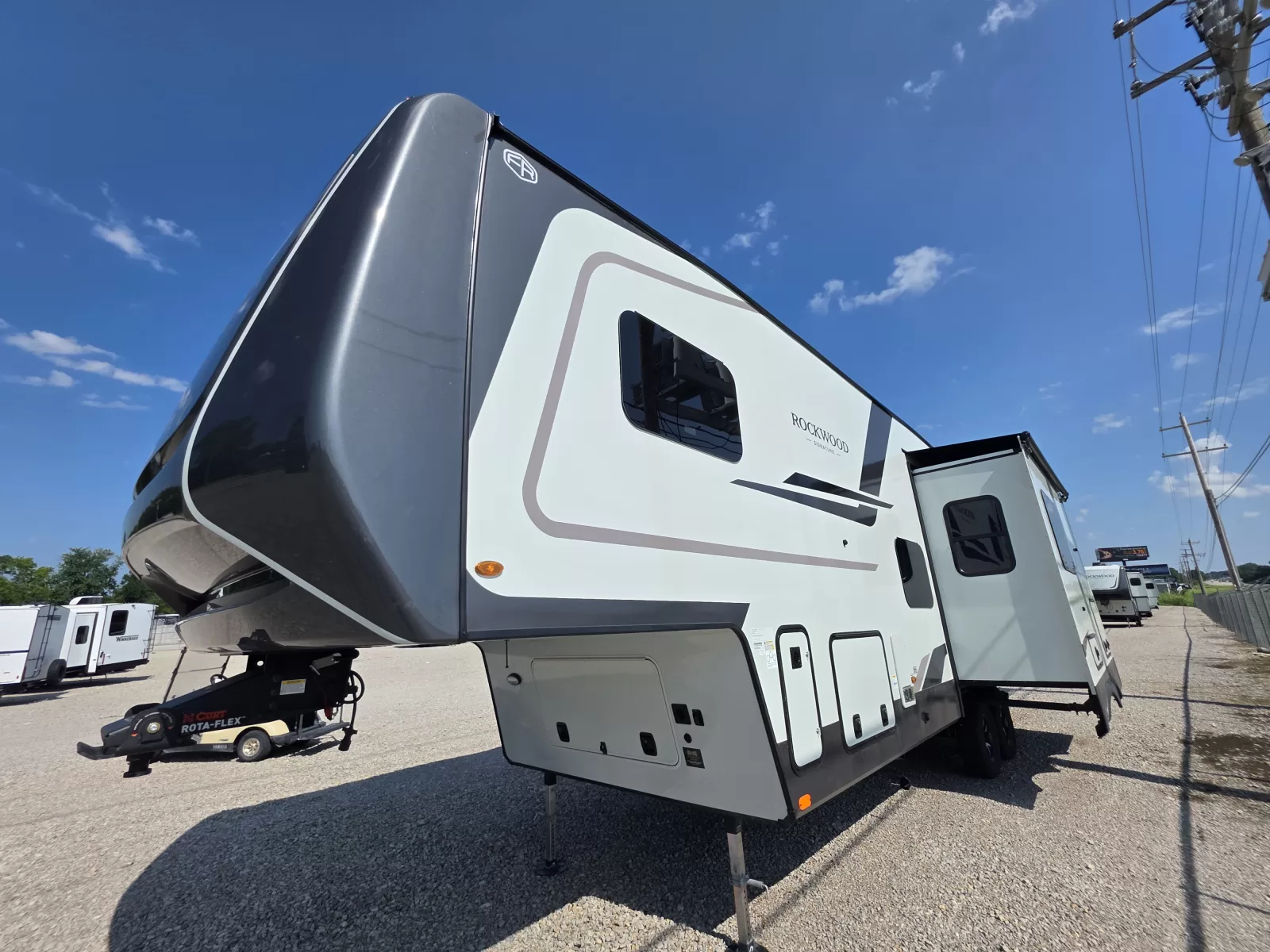 2027 Forest River R374DBH fifth wheel kitchen and dining area available at Bell Camper Sales in Bartlesville, Oklahoma