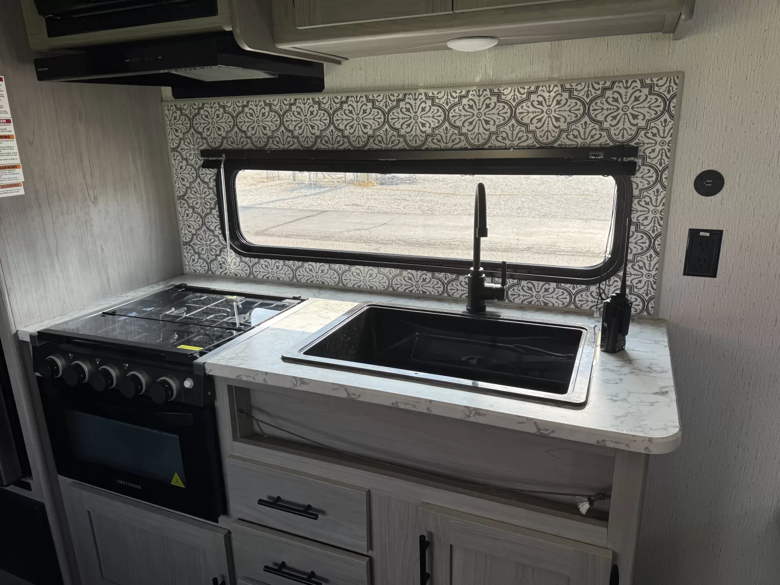 2022 Dutchmen 274BH travel trailer living area at Bell Camper Sales in Bartlesville, Oklahoma