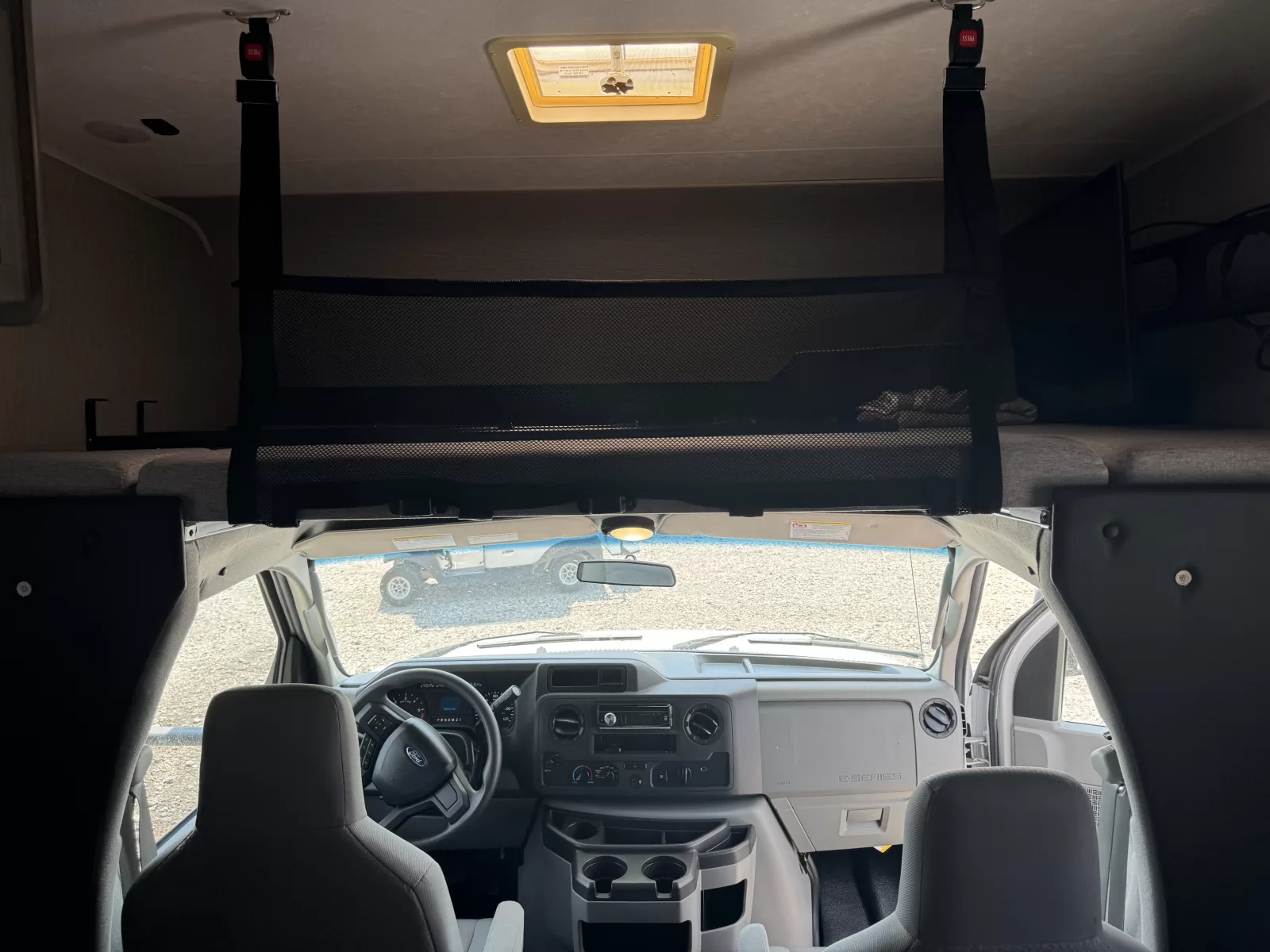 2021 Coachmen 22XG Class C motorhome kitchen and dining area available at Bell Camper Sales in Bartlesville, Oklahoma