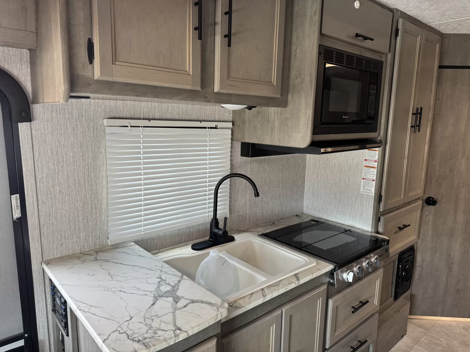 2021 Coachmen 22XG Class C motorhome storage compartment available at Bell Camper Sales in Bartlesville, Oklahoma